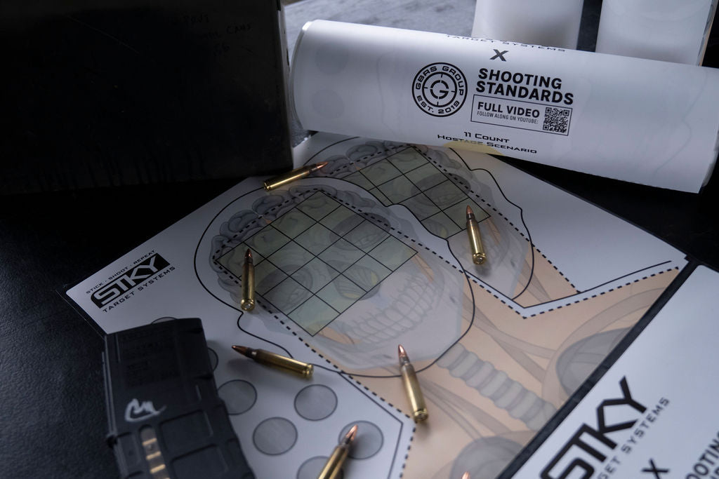 GBRS x STKY hostage targets on the range with brass casings